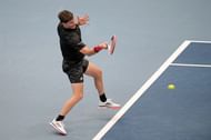 Dominic Thiem hits a forehand